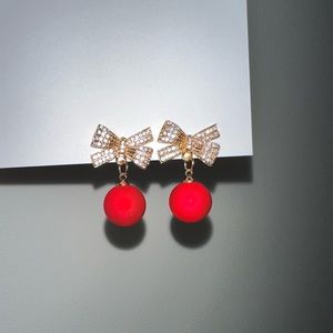 Christmas earrings. Red Ornament